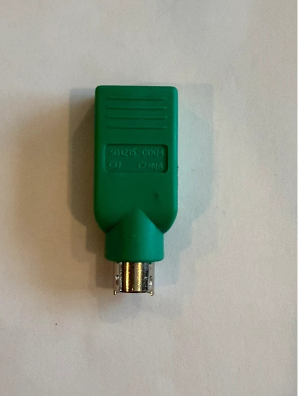 Logitech green PS/2 port to USB mouse adapter, model 501215-0004.